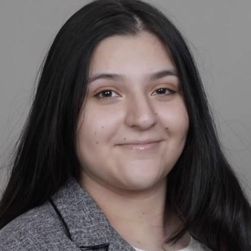 A woman with long, dark hair